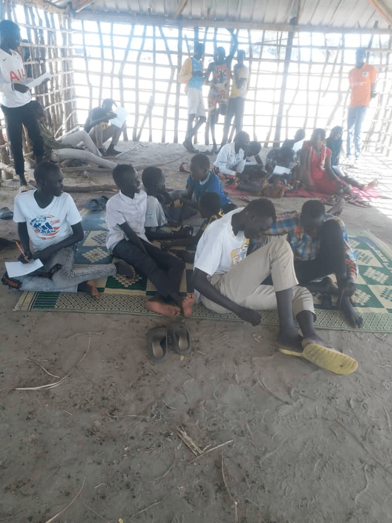 Youth corps members during placement tests at Rubkuay Secondary School, Mayiandit County.